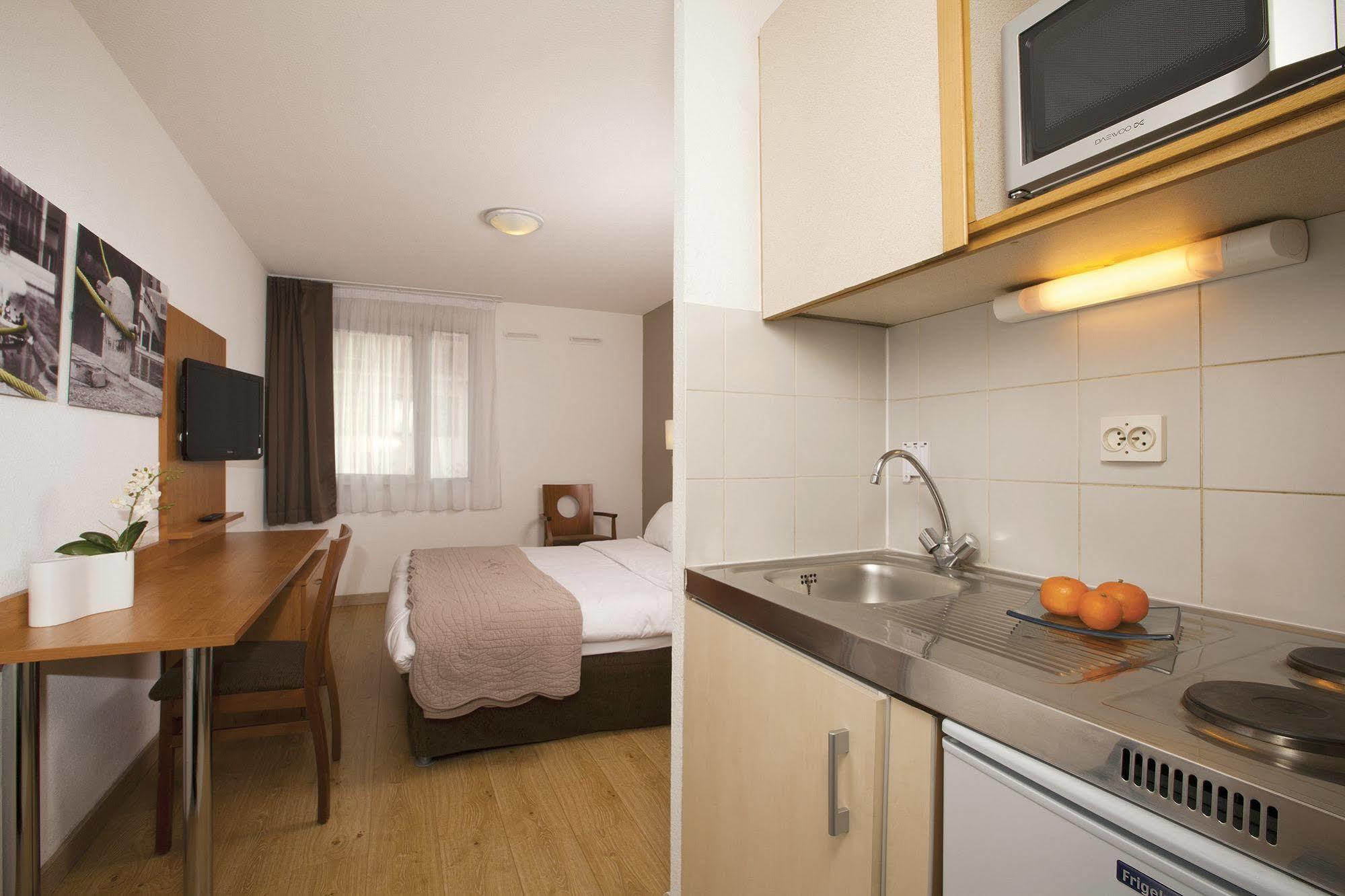 Sejours & Affaires Pantin Charles De Gaulle Aparthotel Exterior foto